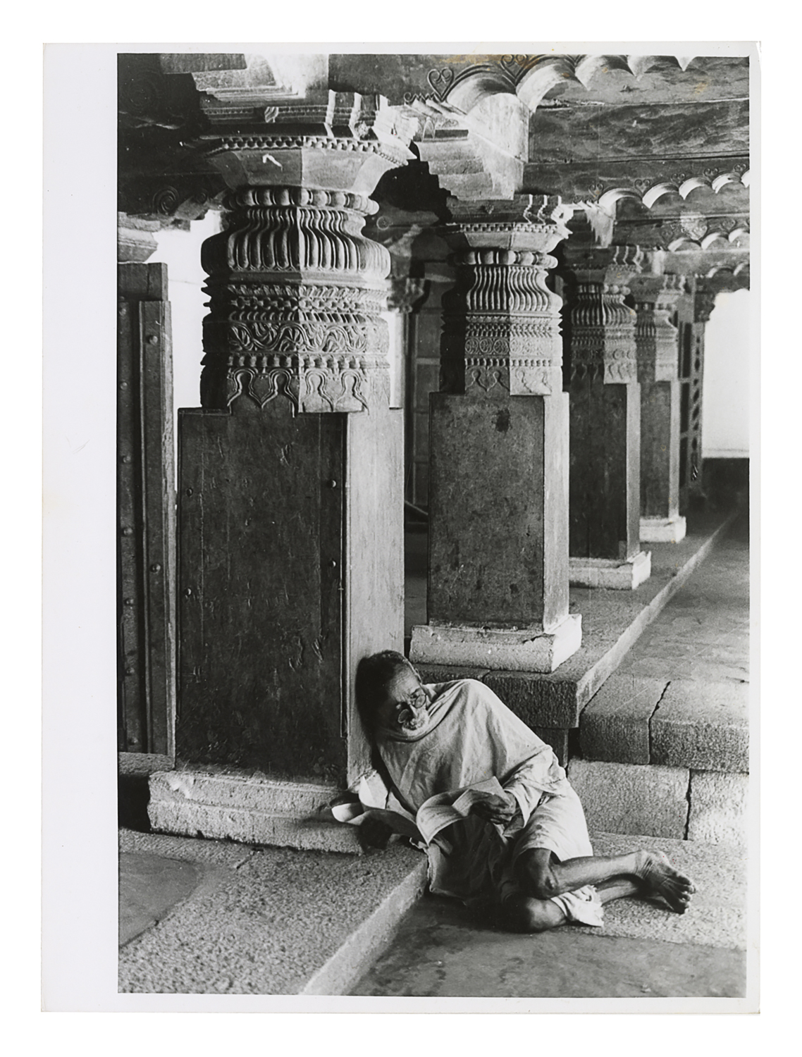 Untitled (Elderly Man Leaning on a Pillar and Reading a Book)
