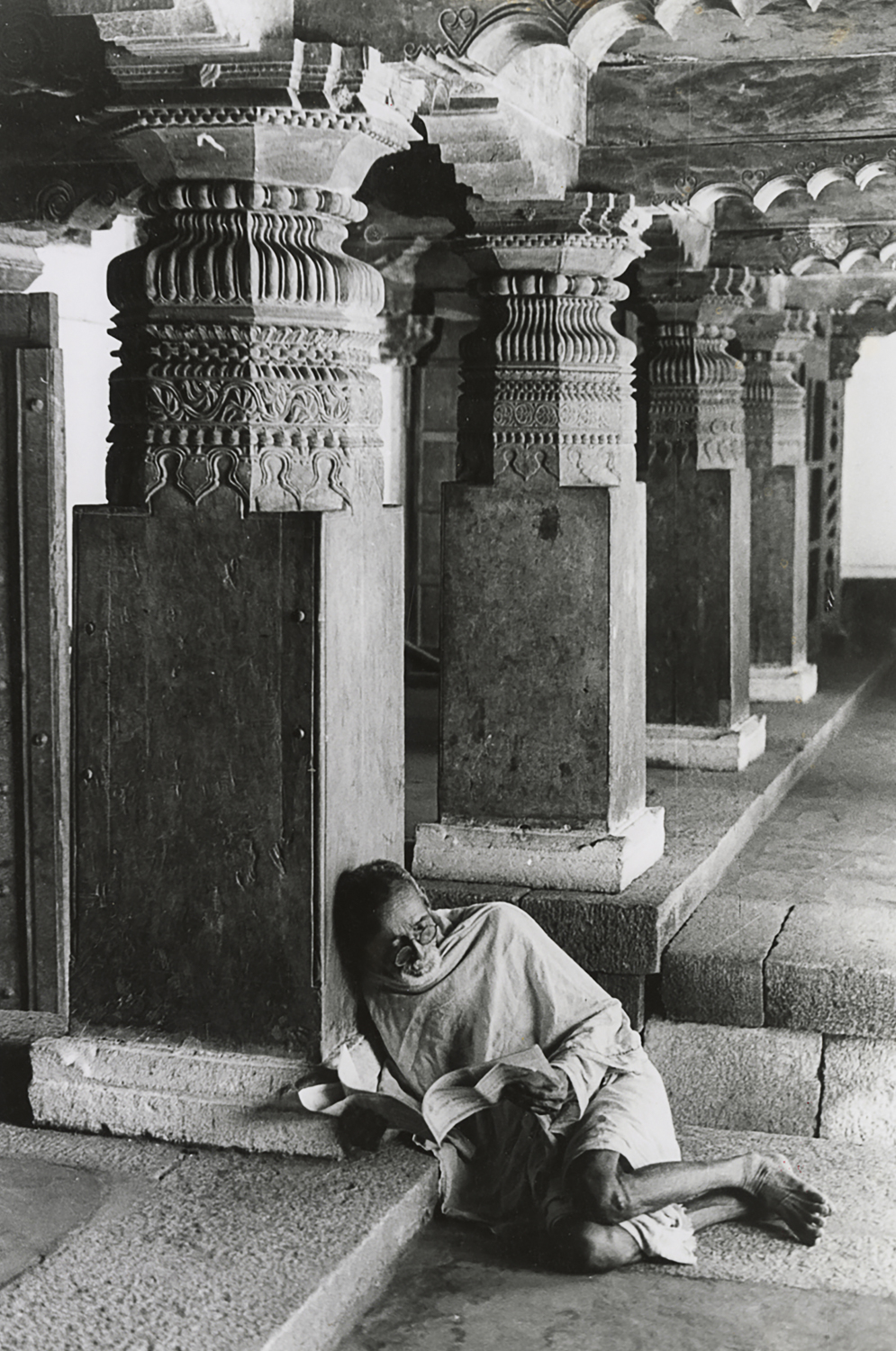 Untitled (Elderly Man Leaning on a Pillar and Reading a Book)